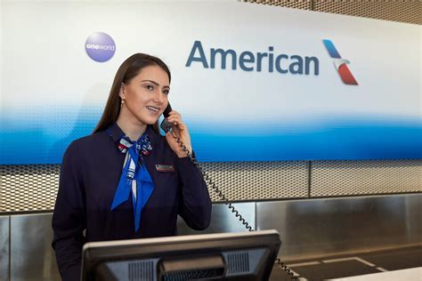 American Airlines customer service desk assisting stranded travelers