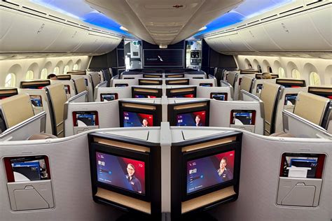 american airlines dreamliner cabin crew preparing for flagship suite service