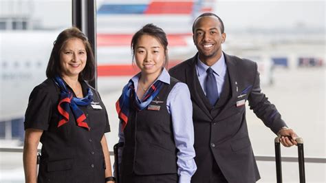 american airlines flight attendants during cabin safety demonstration aboard boeing 787