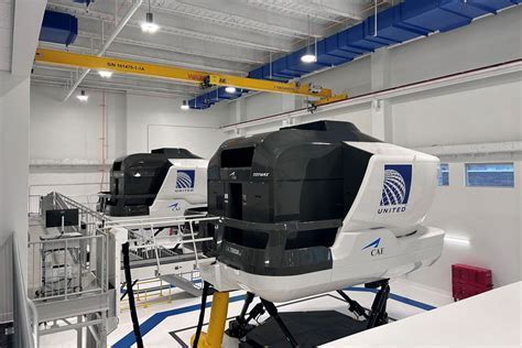american airlines flight school student at simulator in training facility