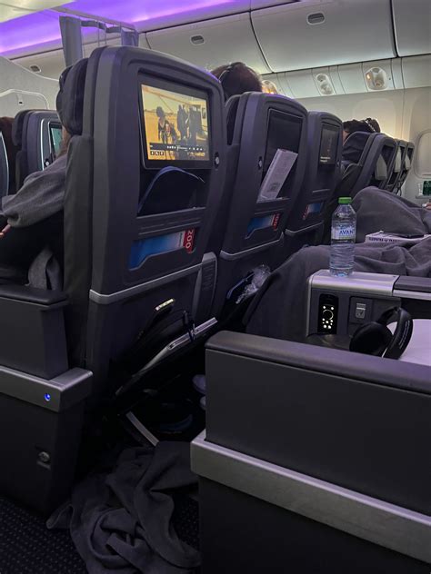 American Airlines premium economy cabin seats with large entertainment screens