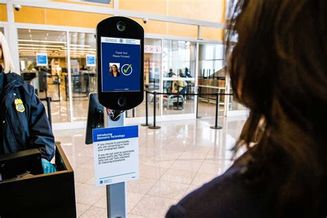 american airlines touchless id boarding gate facial recognition automation