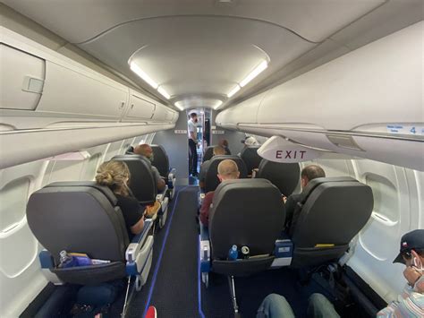 American Eagle CRJ-900 with modern cabin interior on tarmac
