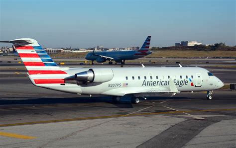 american eagle jet boarding passengers at tampico international airport