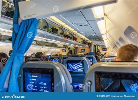 ana economy passengers seated during long-haul transpacific flight
