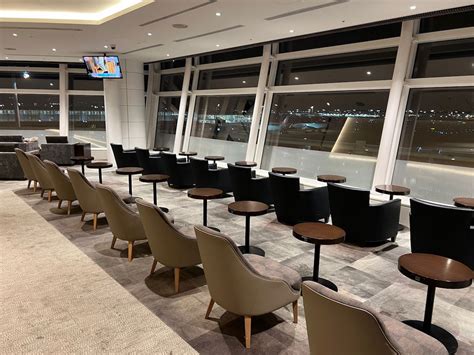ANA Suite Lounge at Haneda Airport with buffet, seating and minimalist design