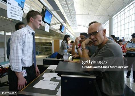 angry airline passengers at airport gate seeking assistance