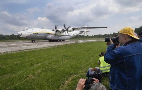 Antonov An-22 preparing for takeoff on a gravel runway