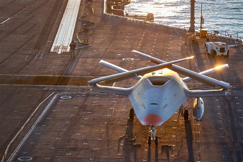 artist rendering of a Navy MQ-25 Stingray refueling aircraft in flight