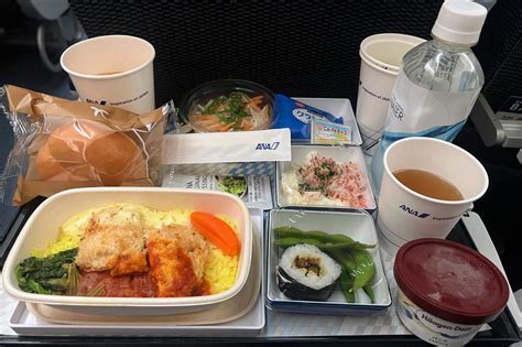 Artistically presented ANA Japanese in-flight meal with various small dishes