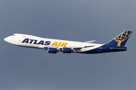 atlas air 747-8f freighter on final approach with landing gear down