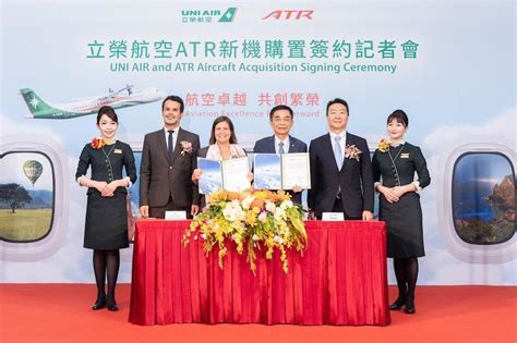 ATR CEO and UNI Air executives at order signing ceremony in Paris