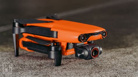 autel evo nano+ drone in mid-flight over beach cliffs