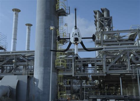 autonomous Voliro T drone inspecting high-altitude LPS on offshore oil platform