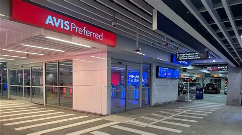 Avis Budget rental car parked at airport terminal