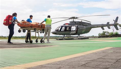 AW109 LUH medical evacuation helicopter preparing for patient loading