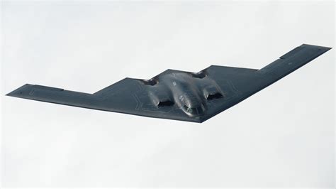 b-2 bomber flying wing stealth aircraft in flight