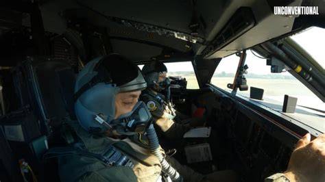 B-2 Spirit bomber pilot and co-pilot inside stealth bomber cockpit