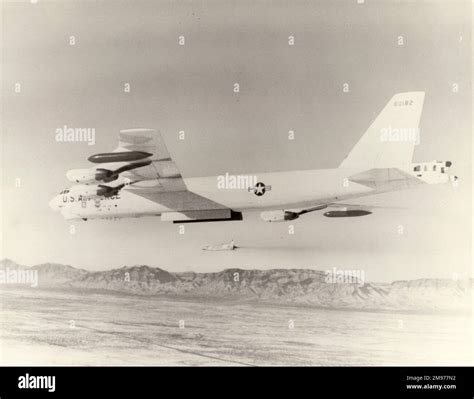 b-52 stratofortress deploying cruise missiles over desert