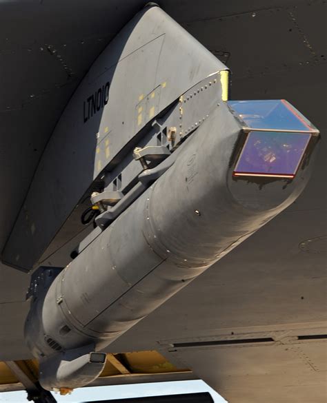 B-52 with targeting pod conducting precision strike mission
