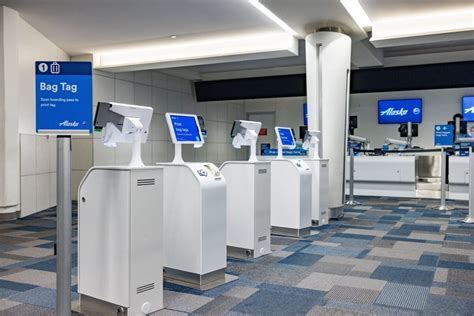 BAGTAG self-service luggage tagging in use at Hawaiian Airlines check-in kiosk