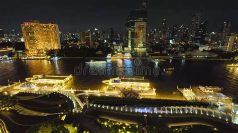 bangkok night view with chao phraya river and temples