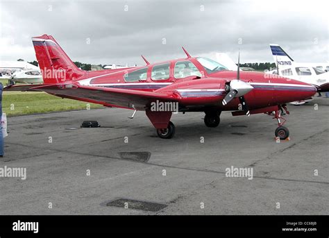 Beechcraft Baron BE55 on taxiway with twin props spinning