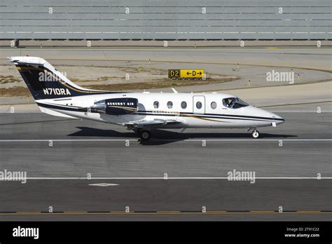 Beechcraft Hawker 400XP at a regional airport, Wheels Up livery visible
