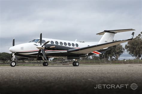 Beechcraft King Air aircraft parked on an airfield tarmac