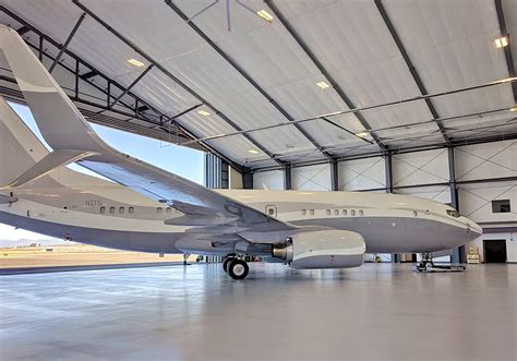 Beechcraft Starship parked on tarmac with empty hangars in background, symbolizing commercial failure