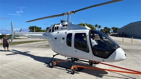 Bell 206 Jet Ranger beside Bell 505 Jet Ranger X for side-by-side comparison, Arizona 2022