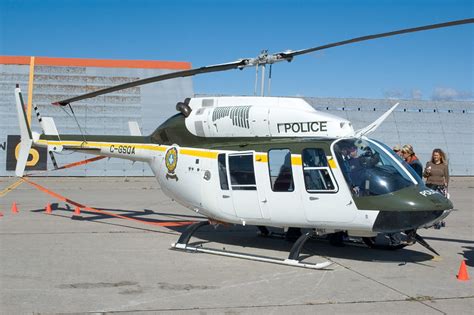 Bell 206LT TwinRanger parked on a helipad with rotor blades still
