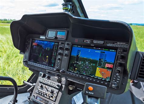 Bell 407GXi cockpit showcasing Garmin G1000H NXi avionics system