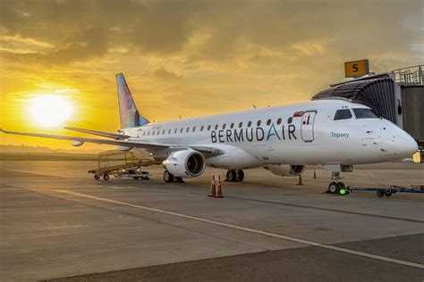 BermudAir passengers boarding Embraer E190 during early morning departure