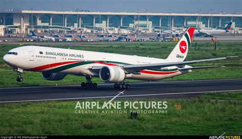 biman bangladesh boeing 777-300ER lifting off from dhaka runway with heavy cargo load