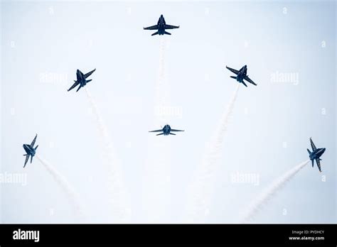 blue angels fleur-de-lis maneuver in sky