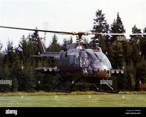 bo-105c helicopter in military search and rescue mission over mountains