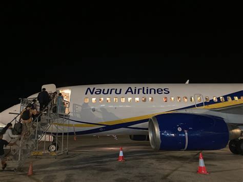 boarding process at a remote island airport served by Nauru Airlines