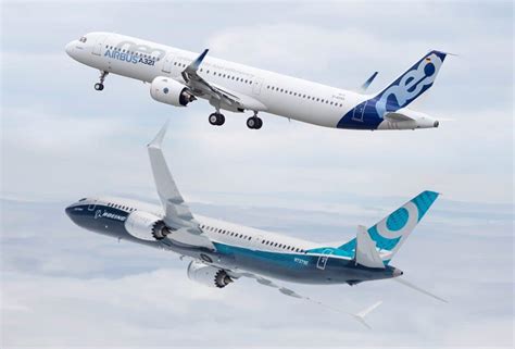 Boeing 737 MAX and Airbus A321neo passenger aircraft on airport runway