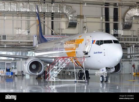 Boeing 737 undergoing heavy maintenance check inside aircraft hangar
