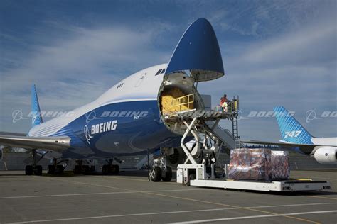 Boeing 747-8F freighter loading cargo through nose door