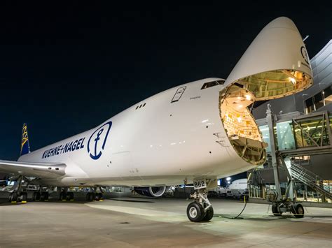 Boeing 747 cargo hold with oversized equipment, highlighting operational versatility