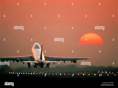 Boeing 747 taking off at sunset with cargo livery