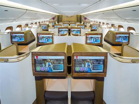 boeing 777-300er cabin interior wide angle view showing seating configuration
