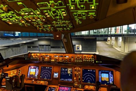 Boeing 777-300ER cockpit digital displays fly by wire controls pilot view