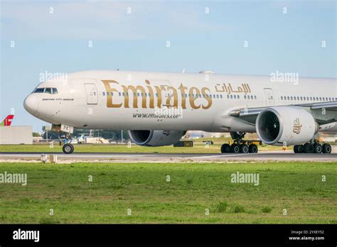 Boeing 777-300ER taxiing at international airport high capacity jet