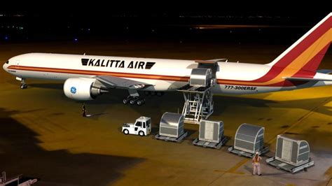Boeing 777-300ERSF Big Twin freighter loading e-commerce cargo pallets