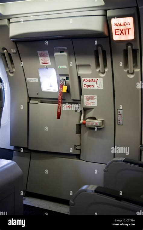 Boeing 777 cabin doors and emergency exits lined along fuselage