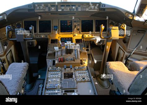 Boeing 777 cockpit with dual control yokes during flight