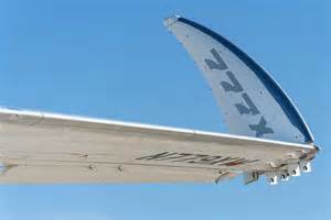 Boeing 777X prototype showing folding wingtip during ground testing